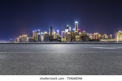 Panoramic Skyline And Buildings With Empty Road?chongqing City At Night
