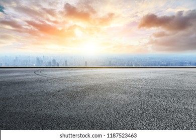 Panoramic skyline and buildings with empty race track road - Powered by Shutterstock