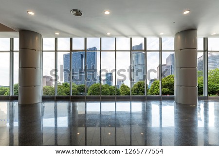 Panoramic skyline and buildings from glass window