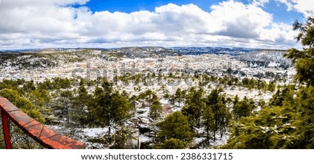 Panoramic of the snowy town seen from the heights, Creel Chihuahua