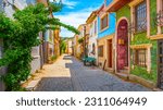 panoramic street view. colorful houses in summer. Historical Greek houses in europe. Travel routes for turkey journey. Village landscape on a hot summer day. Ayvalik city, Turkey.