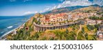 Panoramic summer view from flying drone of San Lucido - town and comune in the province of Cosenza in the Calabria region. Impressive summer scene of Italy, Europe. Traveling concept background.
