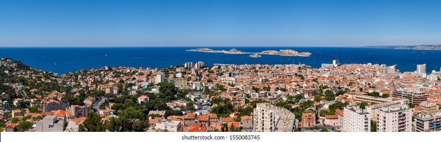 Panoramic Summer View On Marseille Rooftops With Ile Du Frioul And Ile D'If And The Mediterranean Sea. Bouches-du-Rhône (13), Provence-Alpes-Cote D'Azur, France, Europe