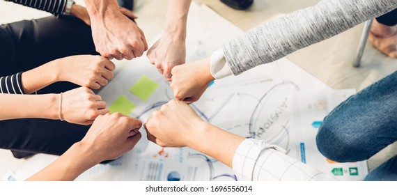 Panoramic teamwork business join hand together concept, Business team standing hands together, Volunteer charity work. People joining for cooperation success business.
