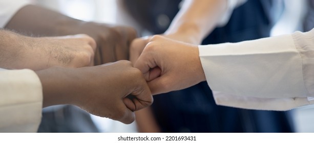 Panoramic teamwork business join hand together concept, Business team standing hands together, Volunteer charity work. People joining for cooperation success business. - Shutterstock ID 2201693431