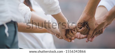 Panoramic teamwork business join hand together concept, Business team standing hands together, Volunteer charity work. People joining for cooperation success business.