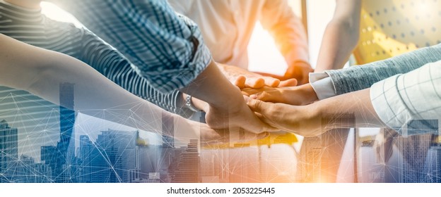 Panoramic Teamwork,empathy,partnership and Social connection in business join hand together concept.Hand of diverse people connecting.Power of volunteer charity work, Stack of people hand. - Shutterstock ID 2053225445