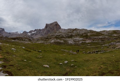 Panoramic upper start section of hiking track PR-PNP 24 to the magnificient summits of Mounts Pena Remona, Torre de Salinas, La Padierna and Pico de San Carlos at Picos de Europa National Park, Spain.