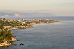 Panoramic View From Above Of A Coastal City On The Ligurian Sea With Cliffs And Beaches, Albenga, Liguria, Italy