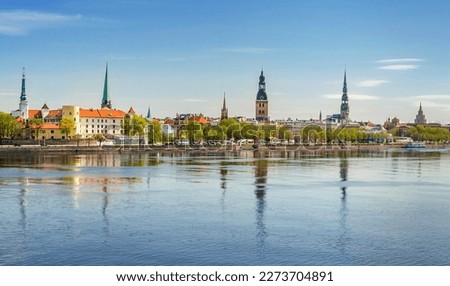 Panoramic view across river of old town in Riga, Latvia with copy space in sky