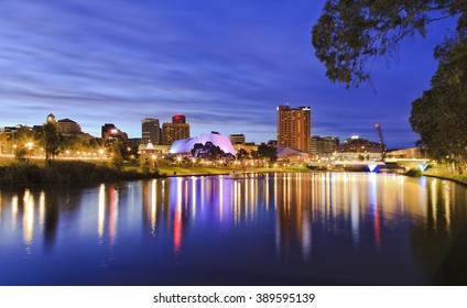 panoramic view of Adelaide's CBD reflecting in still torrens river waters with bright lights and illumination