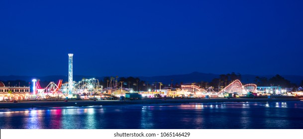 Panoramic View Of Amusement Park On A Beach At Night