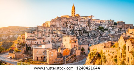 Panoramic view of the ancient town of Matera (Sassi di Matera) in beautiful golden morning light at sunrise, Basilicata, southern Italy