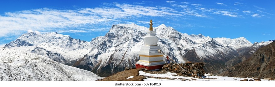 Panoramic view of Annapurna 2 II, 3 III, 4 IV, Ganggapurna and Khangsar Kang, Annapurna range with stupa, way to Thorung La pass, round Annapurna circuit trekking trail, Nepal