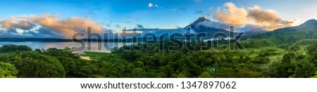 Panoramic view of Arenal Volcano and lake in central Costa Rica
