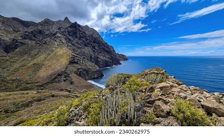 Panoramic view of Atlantic Ocean coastline and Anaga mountain range on Tenerife, Canary Islands, Spain, Europe, EU. Path to beach Playa del Tamadite. Scenic coastal hiking trail from Afur to Taganana - Powered by Shutterstock
