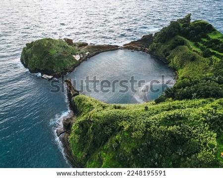 Panoramic view of the Azores. Top view of the islet of Vila Franca do Campo. The crater of an old underwater volcano. San Miguel Island, Azores, Portugal. A heart carved by nature.