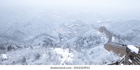 Panoramic view of the Badaling Great Wall with snow covered forest and fog in winter, Beijing, China - Powered by Shutterstock