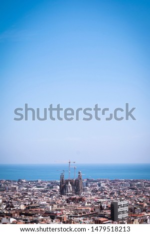 Similar – Panorama von Barcelona mit Büschen im Vordergrund und Sagrada Familia