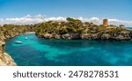 Panoramic view of the beautiful Cala Pi cove and the ancient watch tower built in 1597, in the municipality of Llucmajor, Majorca, Balearic Islands, Spain