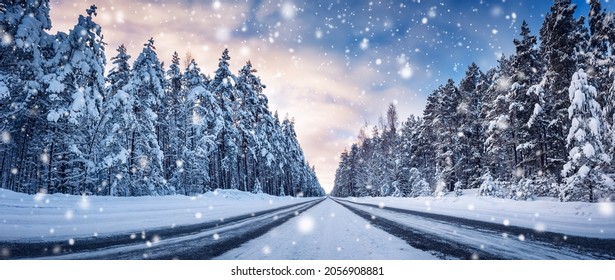 Panoramic view of the beautiful country road in winter in snowfall. - Shutterstock ID 2056908881