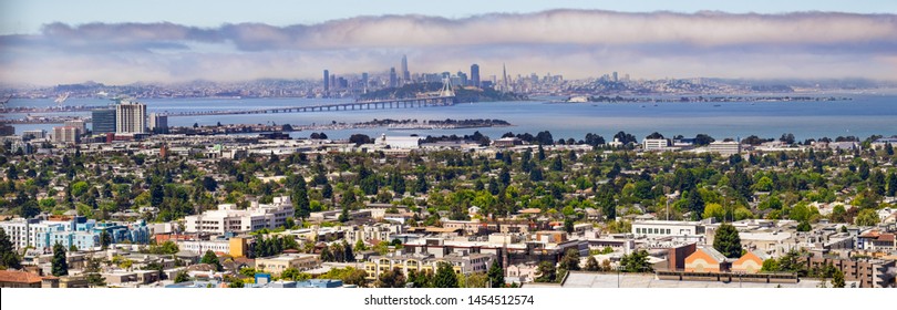 Panoramic view of Berkeley; San Francisco, Treasure Island and the Bay bridge visible in the background; California