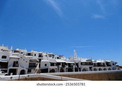 Panoramic view of Binibeca or Binibequer Vell. Urbanization on the island of Menorca, imitating the white houses of fishermen. Balearic Islands - Powered by Shutterstock