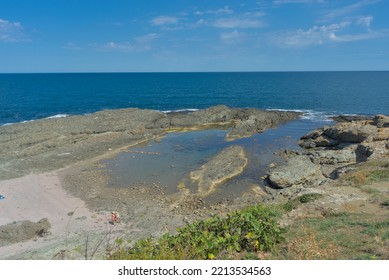 Panoramic View Of The Black Sea From The Coast Of Bulgaria On A Clear Sunny Day. Rocky Coastline And Clear Sea.