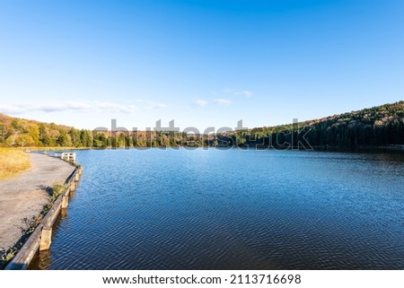 Panoramic view of blue water Spruce Knob Lake in Canaan valley Appalachian mountains in West Virginia sunset in Monongahela National Forest autumn fall season