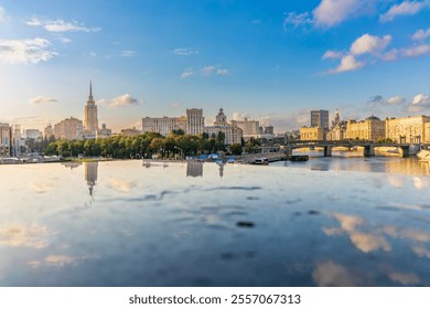 Panoramic view Borodinsky bridge, river Moscow, old buildings and high towers. View of the Borodinsky Bridge and the embankment in Moscow. Urban perspective of Russia capital downtown