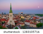 Panoramic view of Bratislava city center at twilight, Slovakia. St. Martin