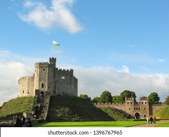 A panoramic view of Cardiff Castle in Cardiff, Wales.  Image has a blue sky in the background and has copy space.