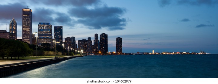 Panoramic View Of The Chicago Skyline And Navy Pier At Dusk