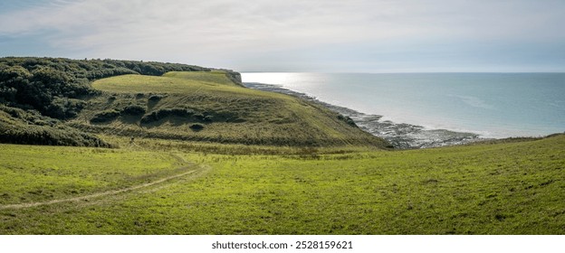 Panoramic view of Cliffs, pastures, meadows and the sea from coastal path - Powered by Shutterstock