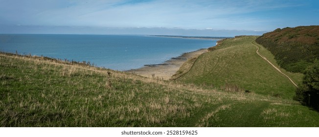 Panoramic view of Cliffs, pastures, meadows and the sea from coastal path - Powered by Shutterstock