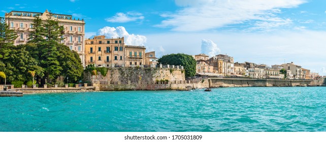 Panoramic view to coastline of Ortigia Island from sea. Syracuse, Sicily, Italy