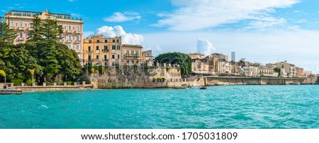 Panoramic view to coastline of Ortigia Island from sea. Syracuse, Sicily, Italy