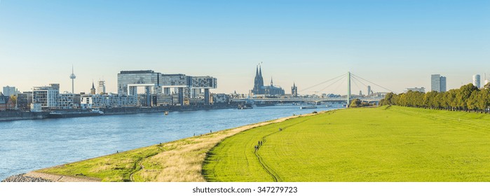 Panoramic View Of Cologne City With Crane Houses And Cathedral, Germany