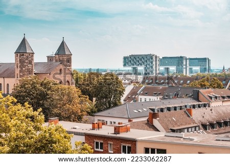 Panoramic view of a Cologne cityscape skyline with historical and modern buildings