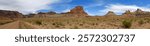  panoramic view of  colorful red rock formations  and assembly hall peak  on a sunny winter day  along the buckhorn draw scenic backway in the northern san rafael swell near green river,  utah