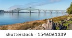 Panoramic view of Conde McCullough Memorial or Coos Bay Bridge cantilever bridge that spans Coos Bay on U.S. Route 101 near North Bend, Oregon.