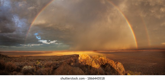 Panoramic view of a double rainbow with a thunderstorm over the Greater Karoo in South Africa - Shutterstock ID 1866443518