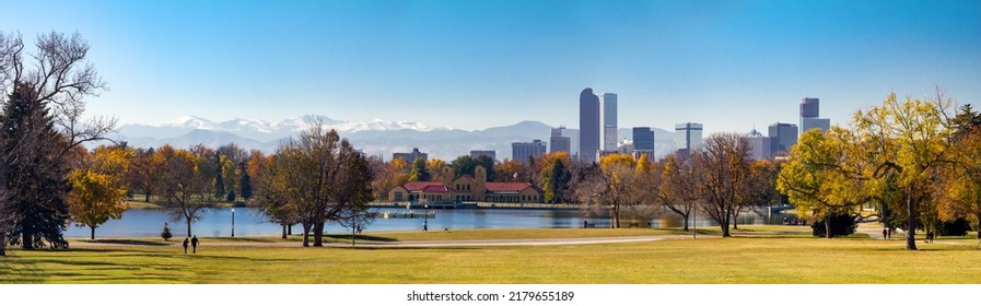 Panoramic View Of Downtown Denver Colorado From City Park In Fall With The Front Range Mountains In The Background