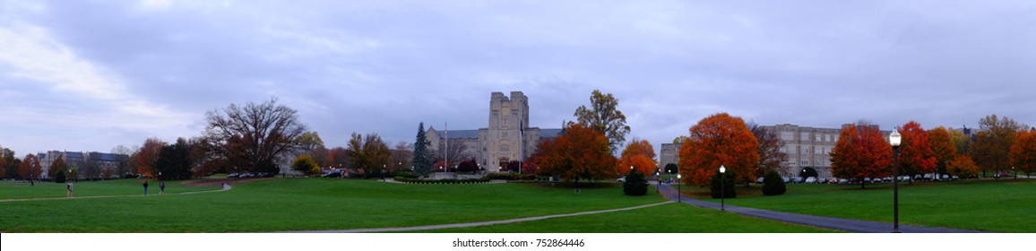 Panoramic view of Drillfield with Burrus Hall in the background during the fall with orange and maroon colors, at Virginia Tech University, Virginia, USA