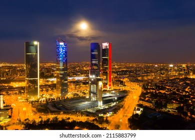 Panoramic View From Drone Of Illuminated Cuatro Torres Business Area At Night, Madrid, Spain