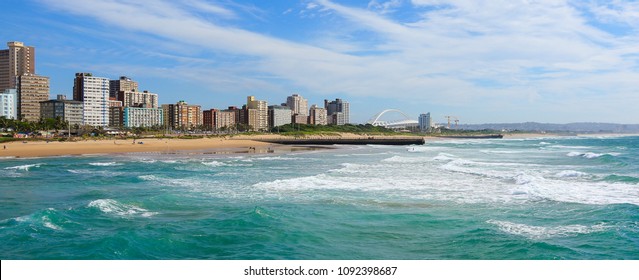 Panoramic view of Durban's "Golden Mile" beachfront as seen from from the Indian Ocean with waves, KwaZulu-Natal province of South Africa