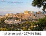 Panoramic view during sunset of the Parthenon of the Acropolis seen from Filopappou Hill, Athens, Attica, Greece, Europe. Ruins of Ancient Greek temples, birthplace of democracy and civilization