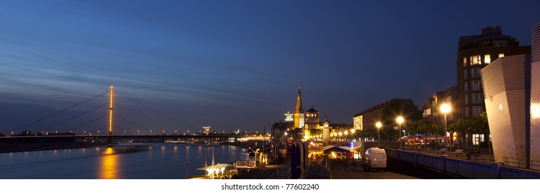 Panoramic View Of Dusseldorf Altstadt With Rhine River And Oberkasseler Bruecke Bridge