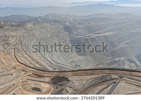 Panoramic view of dust pollution in an open-pit mine and environmental control process