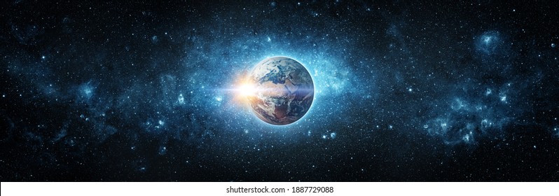 Panoramic view of the Earth, sun, star and galaxy. Sunrise over planet Earth, view from space. Concept on the theme of ecology, environment, Earth Day. Elements of this image furnished by NASA.
